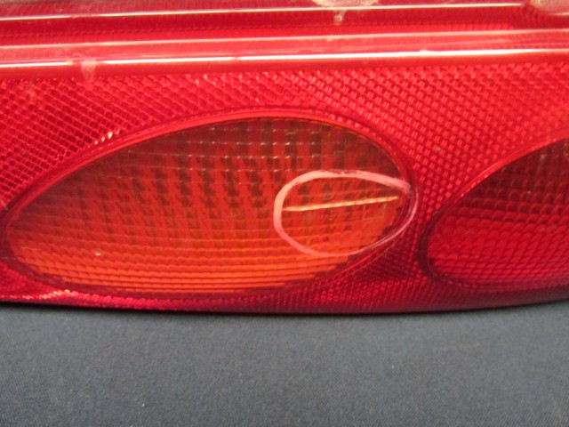 Fiat Seicento  46511337  számú, jobb hátsó lámpa, a képen látható sérüléssel