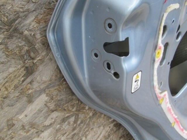 147878 Fiat Linea bal hátsó ajtó a képen látható sérüléssel