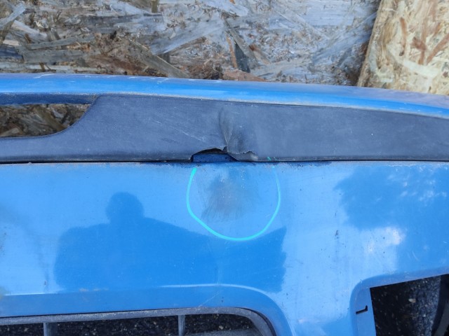172969 Fiat Punto III. 2003-2010 kék színű első lökhárító, a képen látható sérüléssel