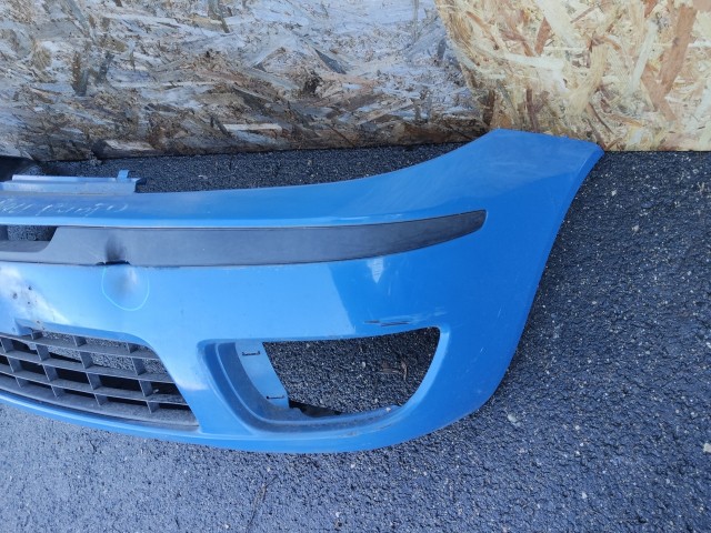 172969 Fiat Punto III. 2003-2010 kék színű első lökhárító, a képen látható sérüléssel