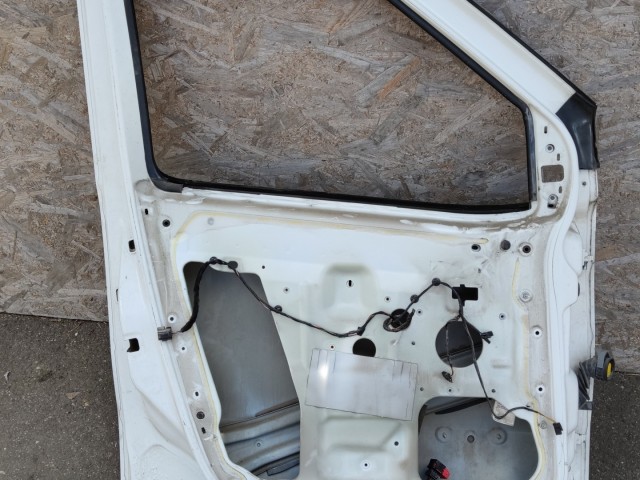 184265 Fiat Doblo 2009-2022 bal első ajtó, a képen látható sérüléssel